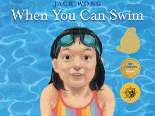 Cover of the book: When You Can Swim. A girl with googles on her forehead looks out at the reader with a wide-eyed, contented look.  Three gold seals adorn the cover, denoting the book's awards: the Horn Book Fanfare Best Book, the Governor General's Literary Award, and the Marilyn Baillie Picture Book Award.