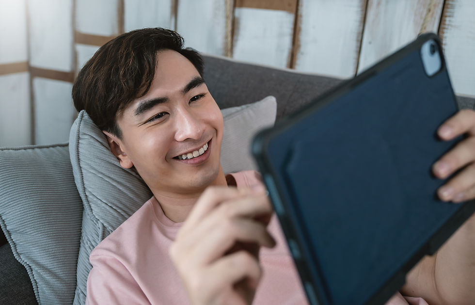 A man interacts with a tablet