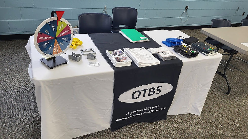 An OTBS informational table set out at an event