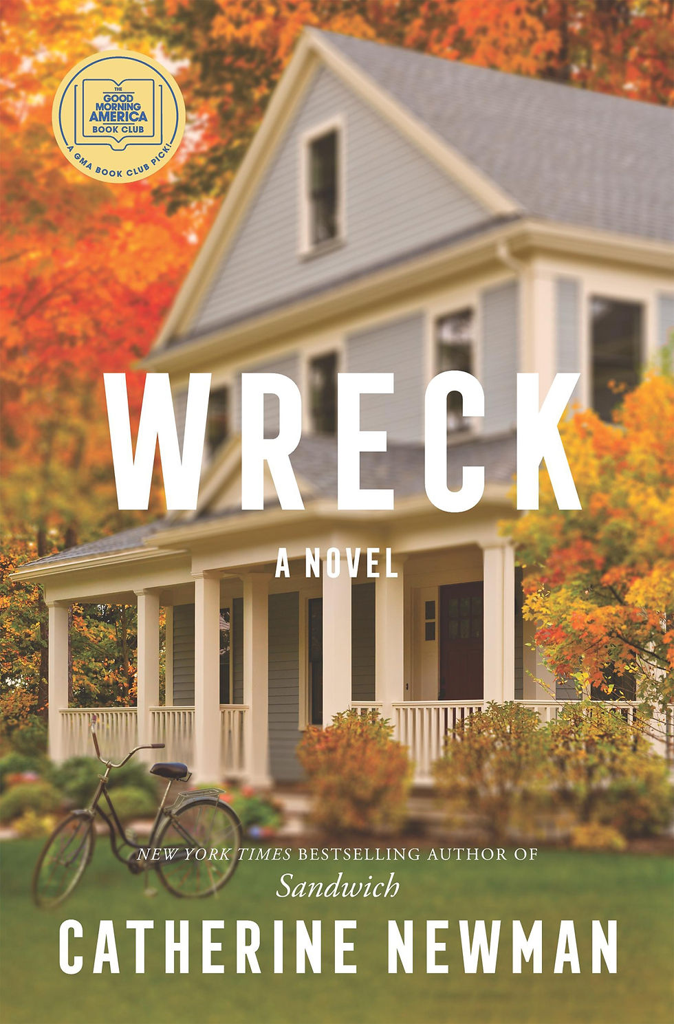The cover of Wreck: A Novel by Catherin Newman. A two-story farmhouse-style home with a wrap-around porch sits amid trees with leaves changing to various fall colors.