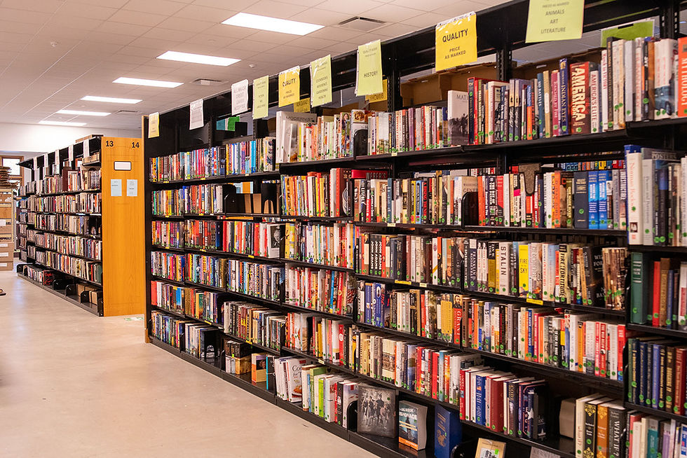 A full used book sale room before a book sale