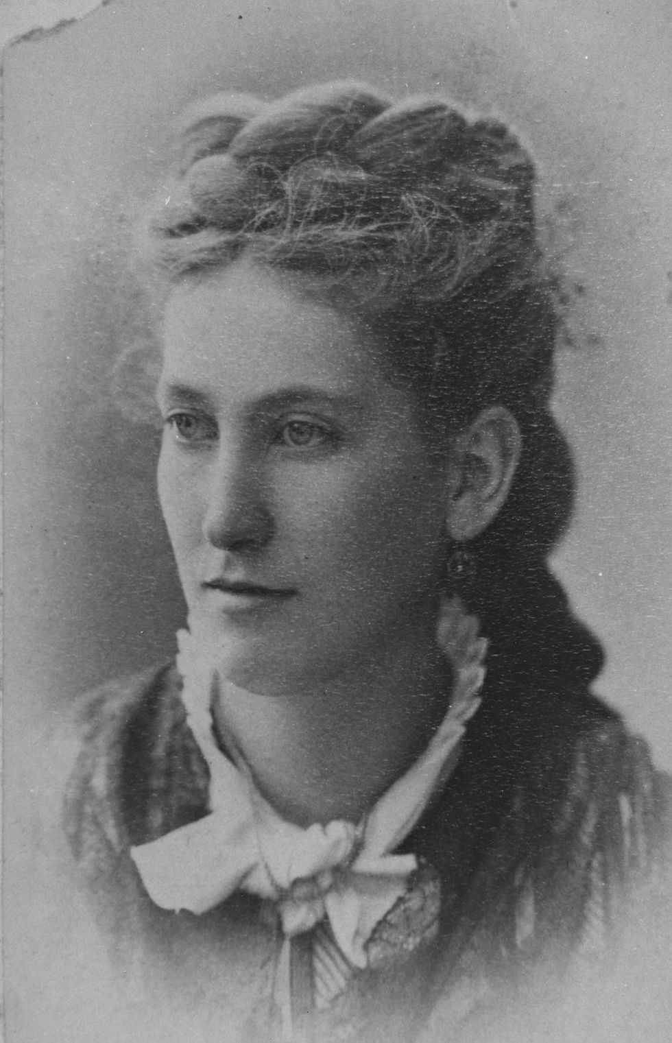 A historical headshot of Eva Woodward Parker