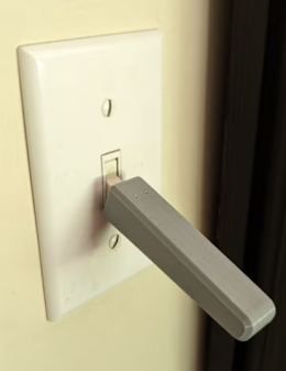 This device extends a light switch arm making it easier for those with arthritis, limited grip strength or finger dexterity to flip lights on or off.