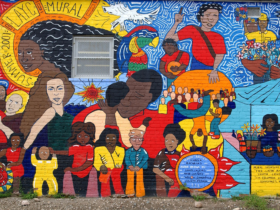 A colorful mural with flowers, a sun, an hispanic familes and friends hugging, fancing, and making music.