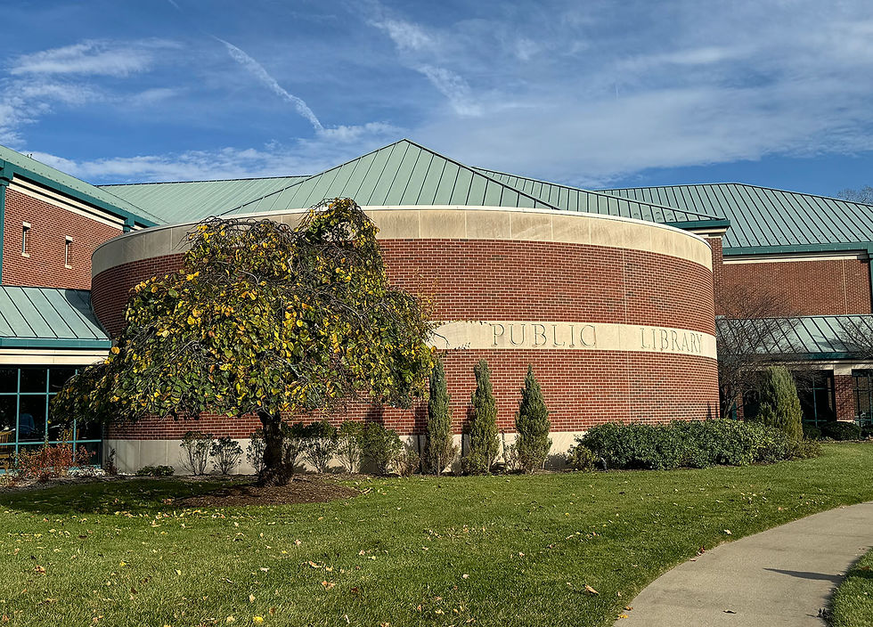 The front of the current RHPL building and a Camperdown Elm Tree on the West Lawn.