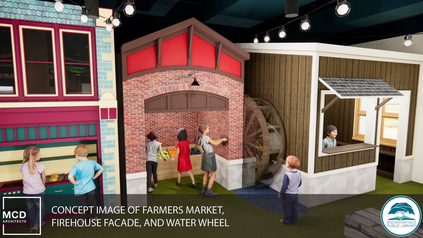 Play area featuring a cider mill with an enclosed water wheel.
